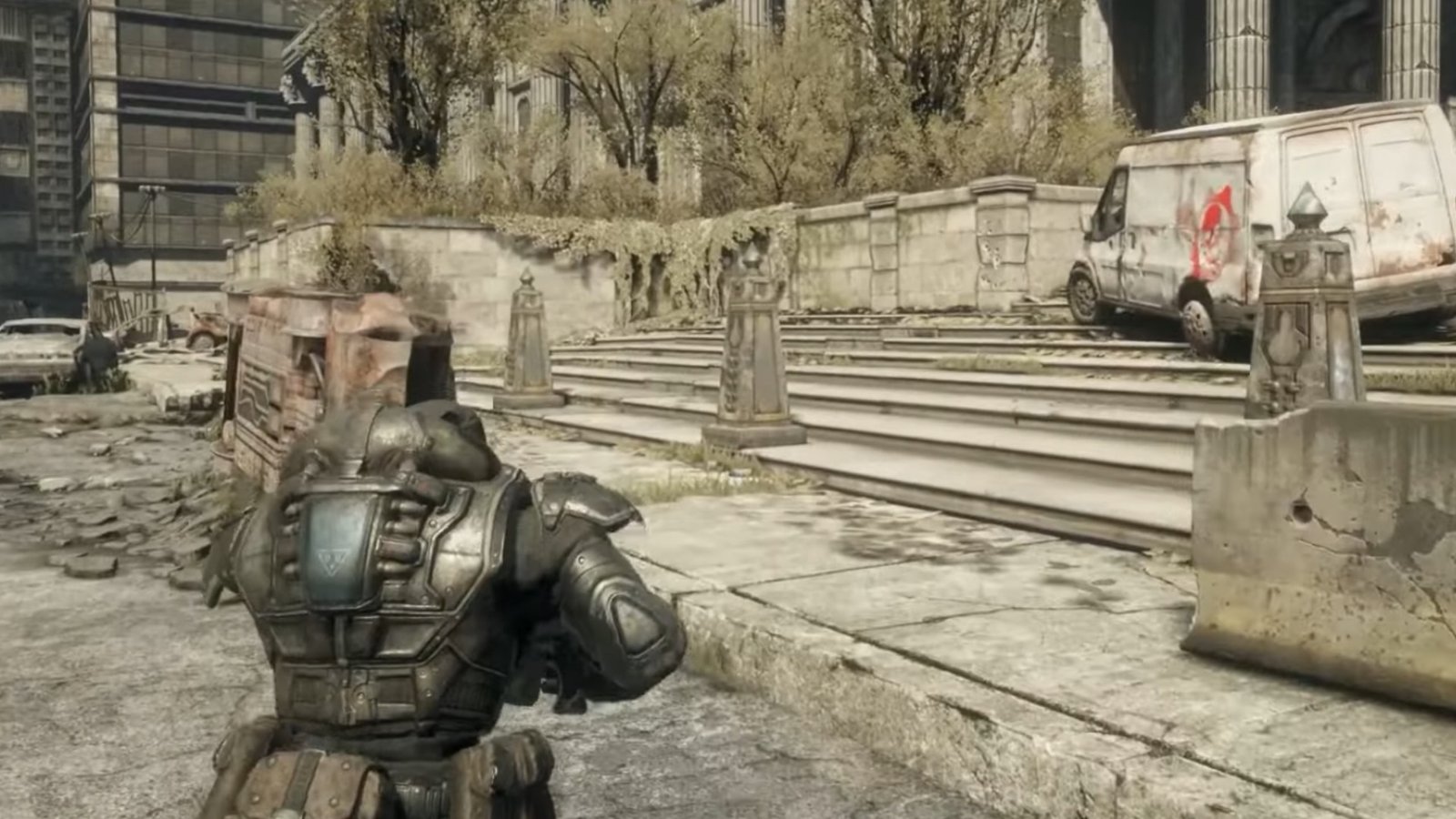 Gears of War: Reloaded screenshot featuring a white van with the red Gears of War icon in front of the House of Sovereigns.