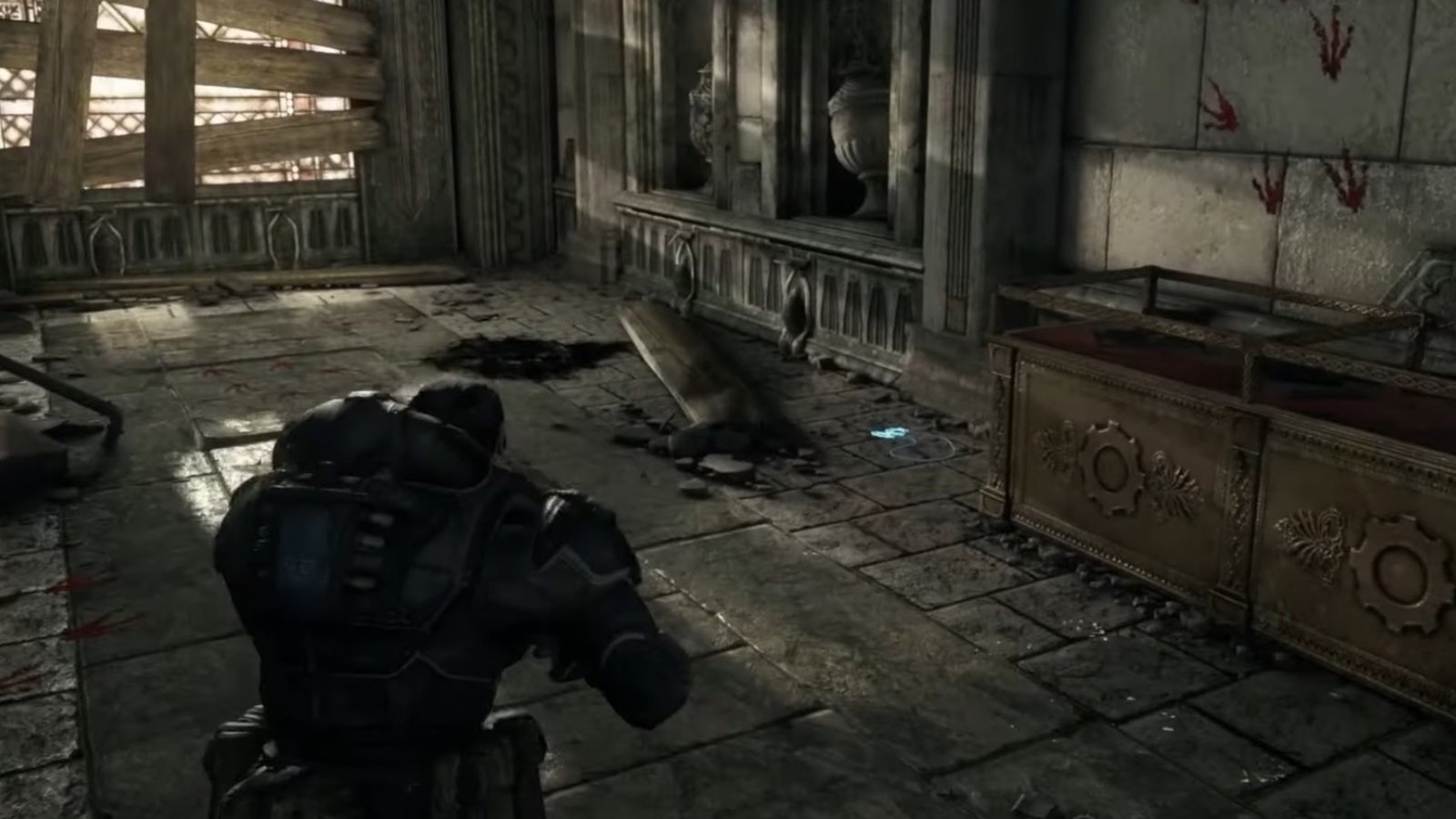 Gears of War: Reloaded screenshot a COG Tag laying beside a cabinet by a giant boarded-up window.