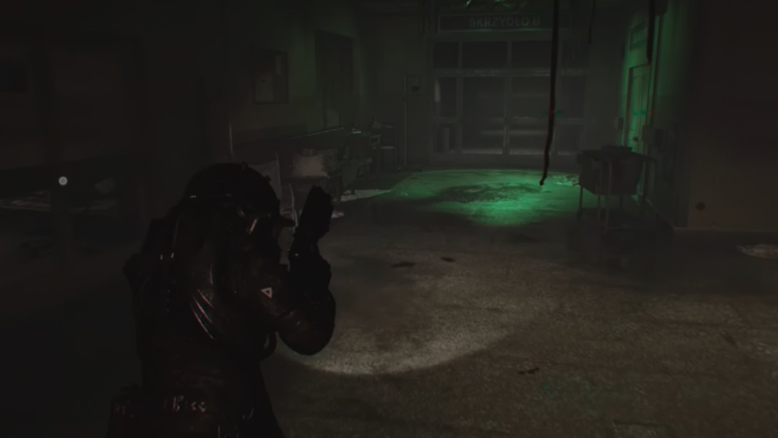Cronos: The New Dawn screenshot featuring the Traveler at the Operation Block Hallway.