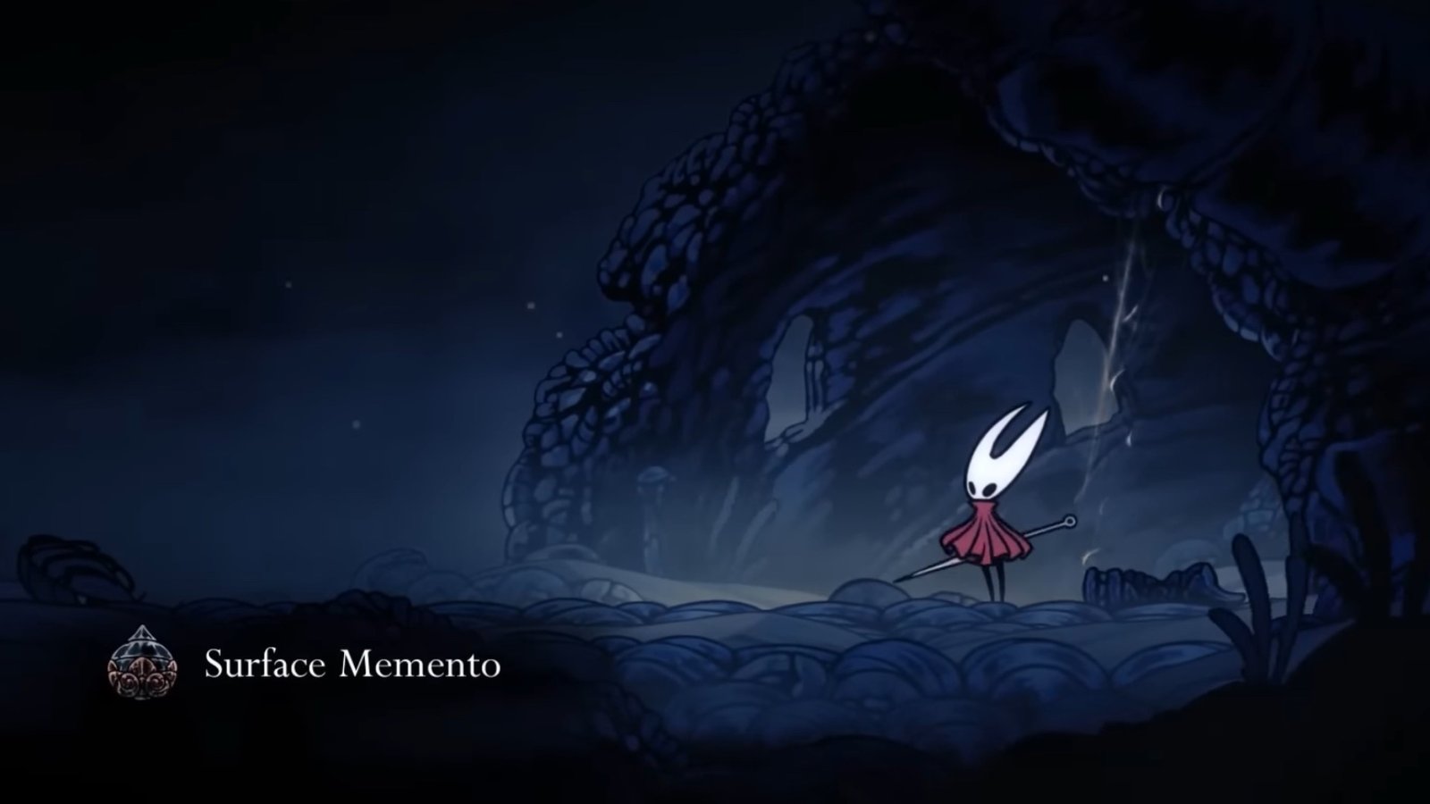 Silksong featuring Hornet inside the Nameless Town at the Surface Memento location.