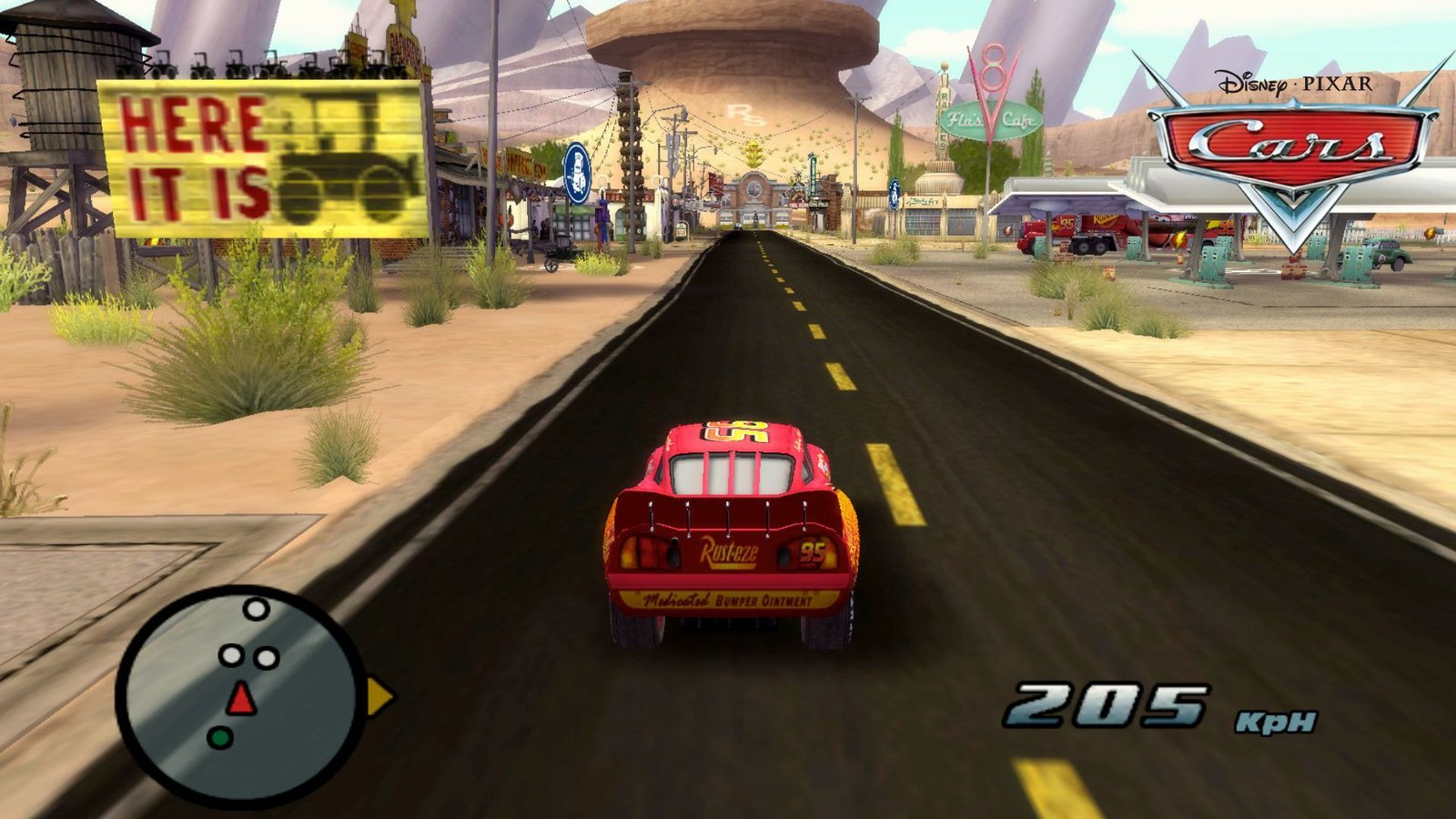 Cars game screen. Lightning McQueen races at 205kpH