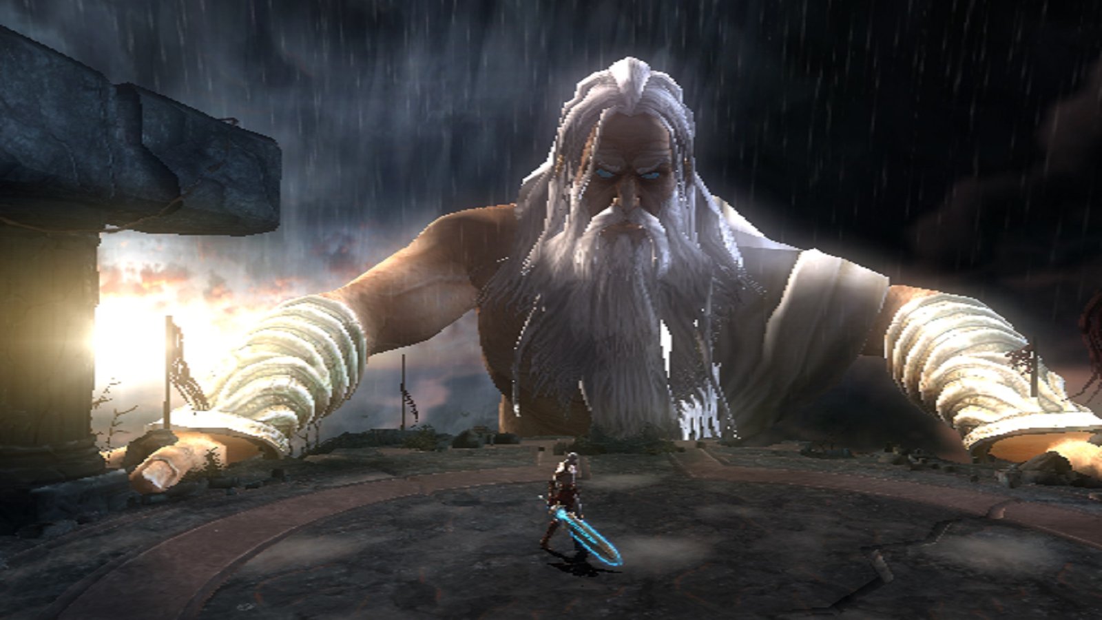 A fight scene from God of War II for PS2 showing Kratos and a giant.