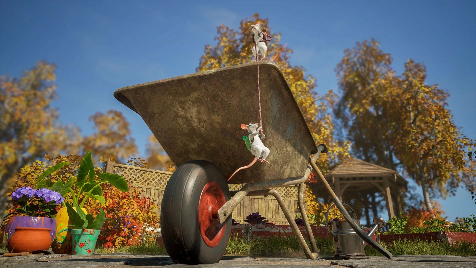 Two mice climbing around on a wheelbarrow in Hela.