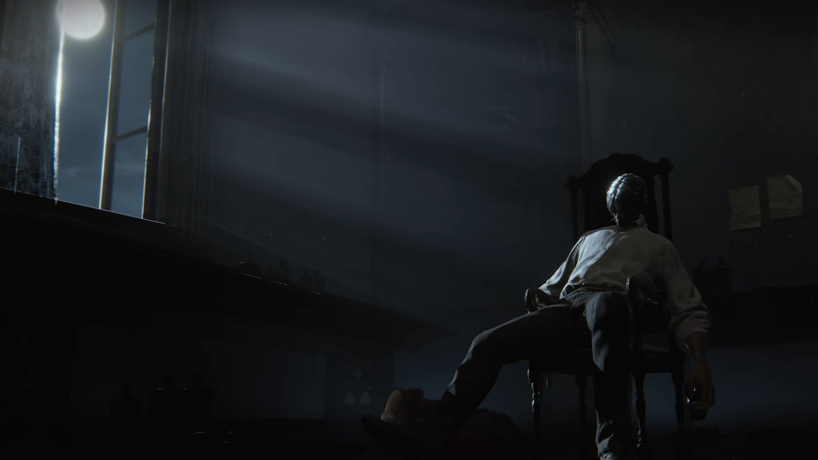 A vampiric humanoid sat in a chair in the light in The Duskbloods.