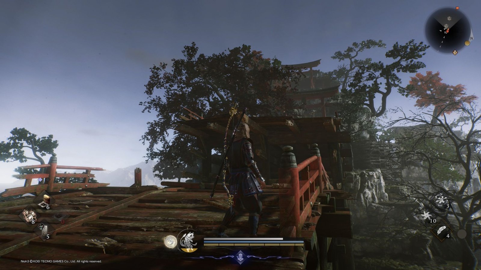 Approaching a building with a broken bridge in Nioh 3