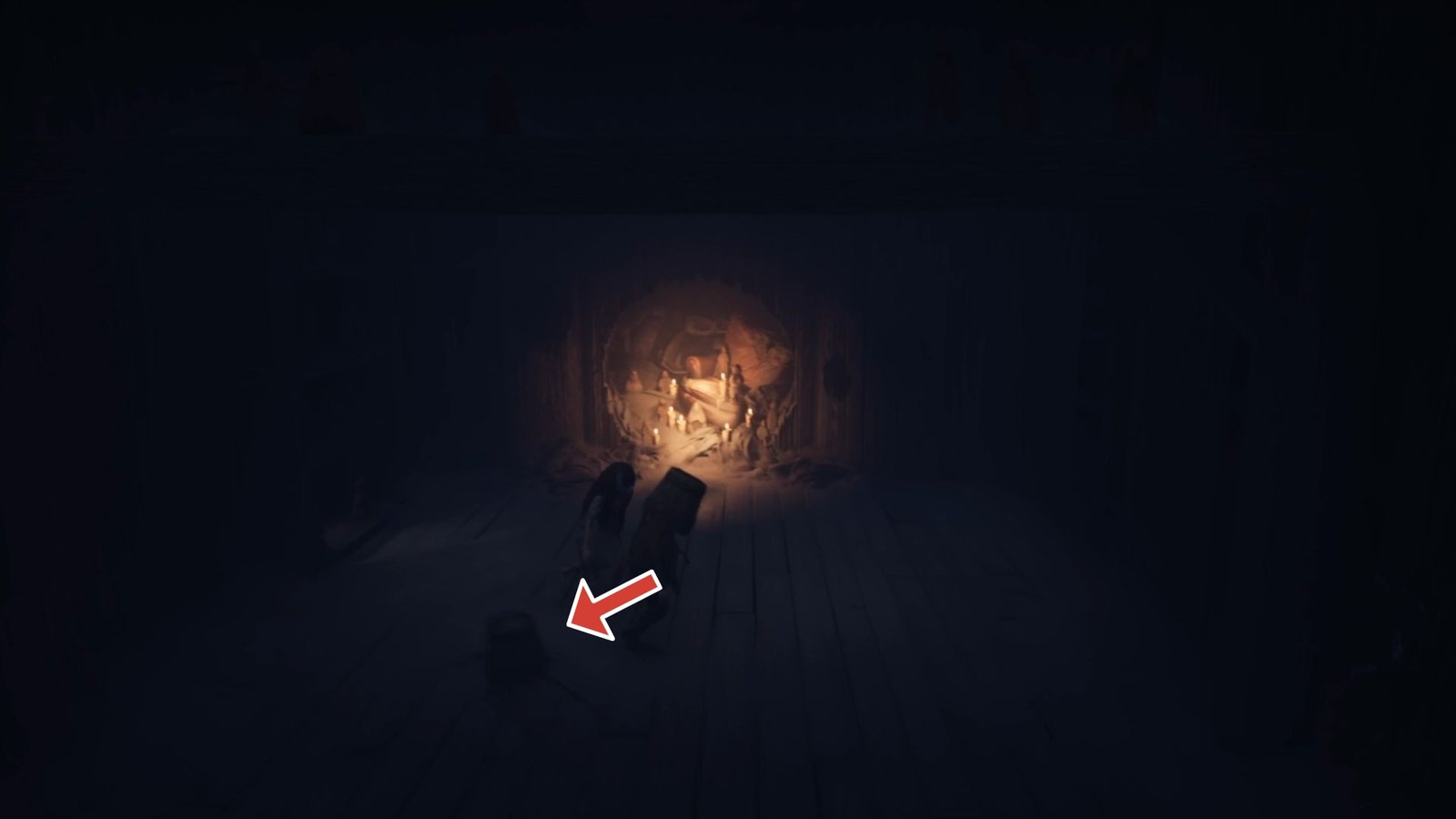 Arrow pointing to a critter running away from the player in Reanimal