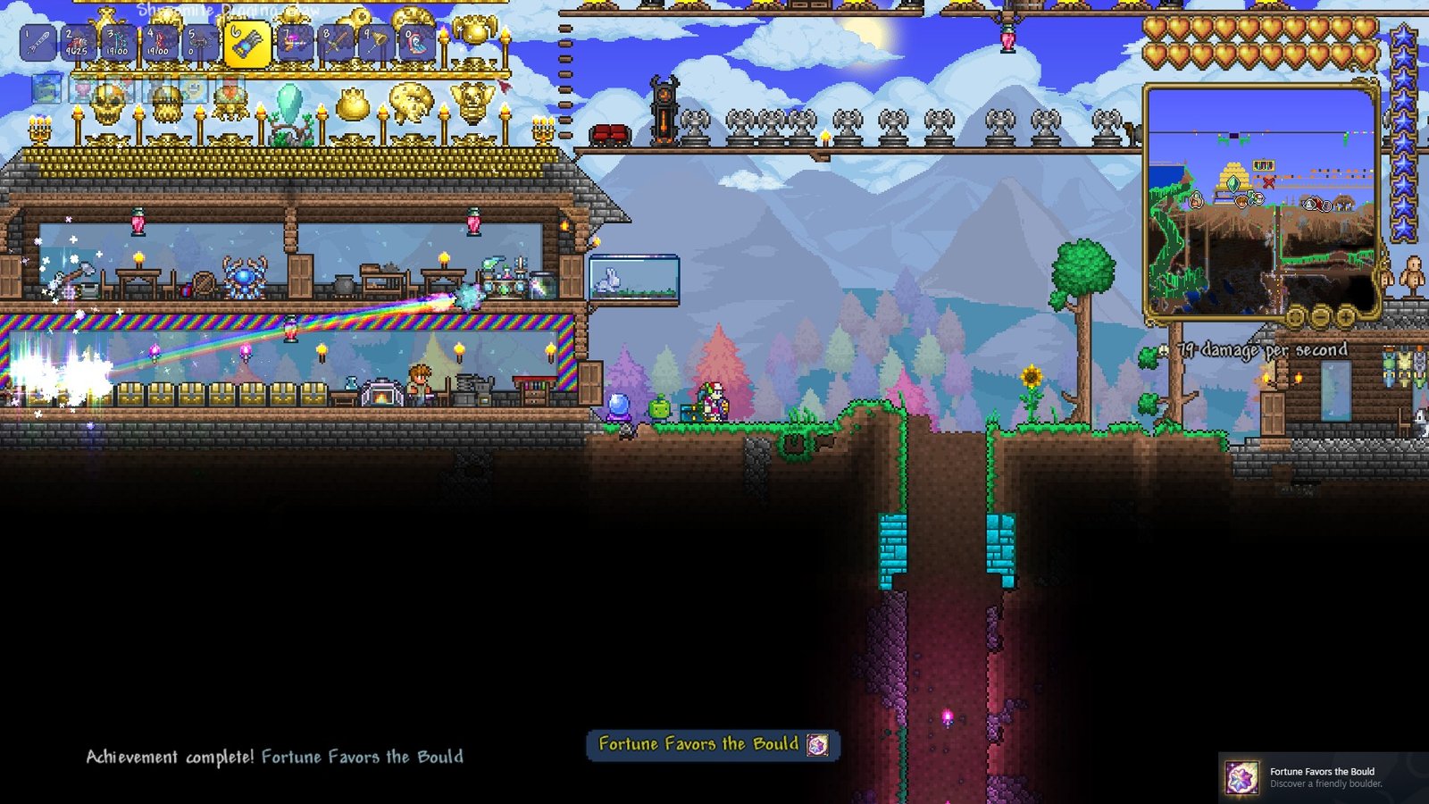 Screenshot of a Terraria 1.4.5 player activating a Rainbow Boulder, getting the new achievement "Fortune Favors the Bould".