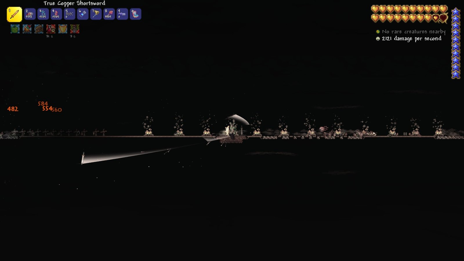 Screenshot of a player farming for Bestiary entries in a Graveyard in Terraria 1.4.5.