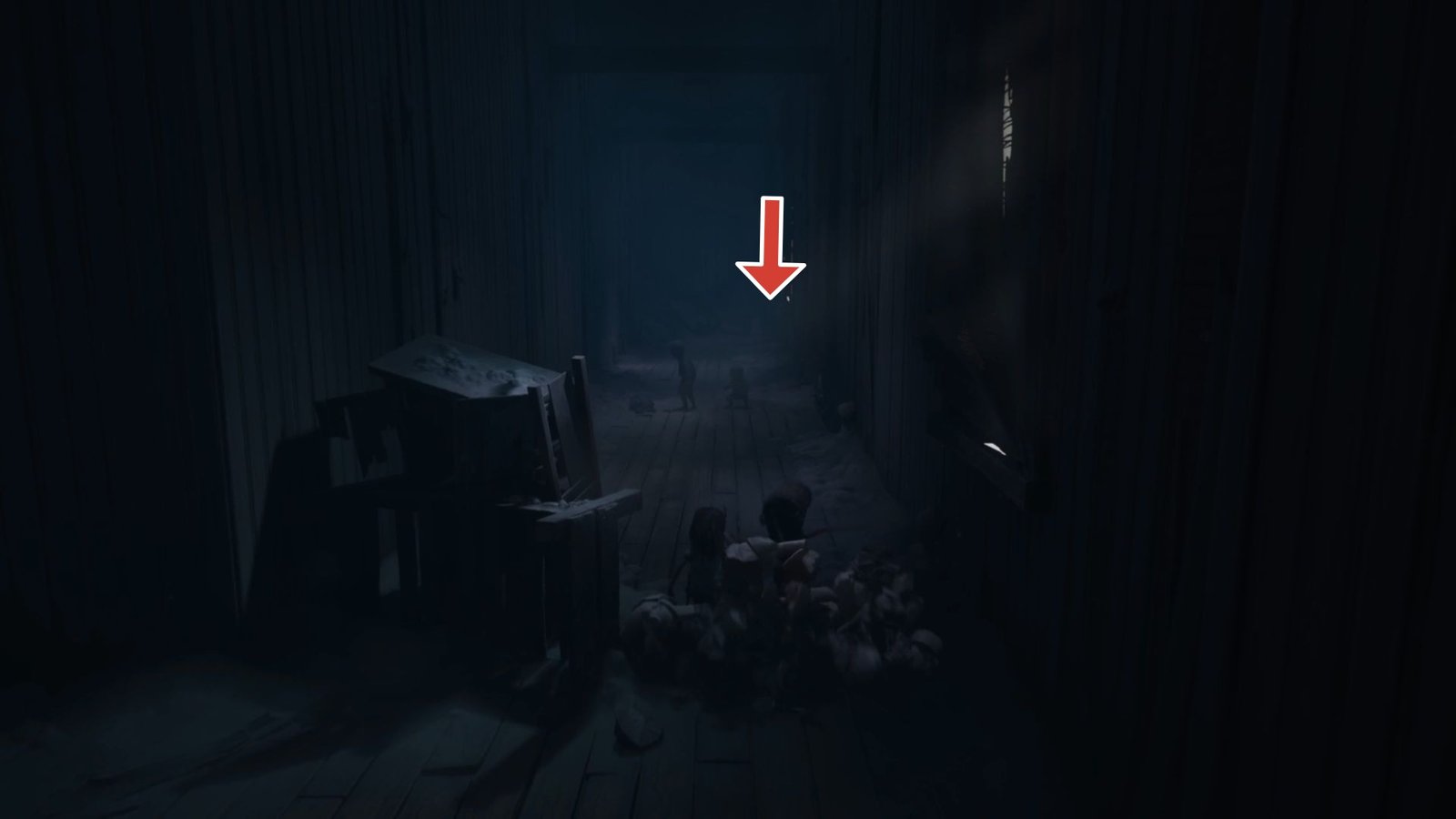 Arrow pointing to the path to find a hidden statue in Reanimal