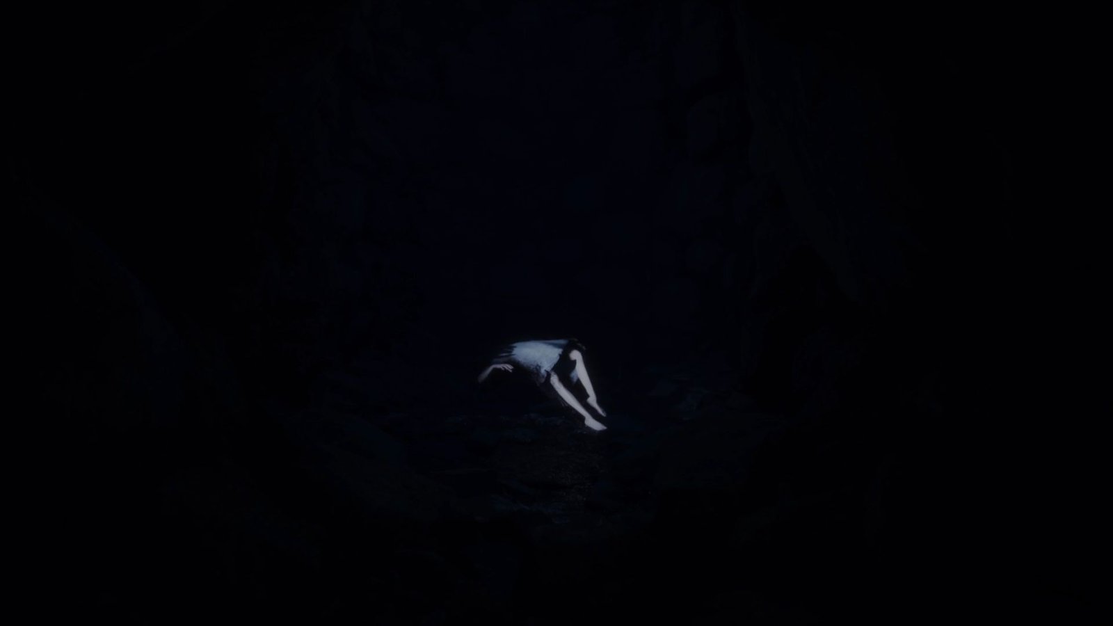 Girl levitating at the bottom of the well in Reanimal