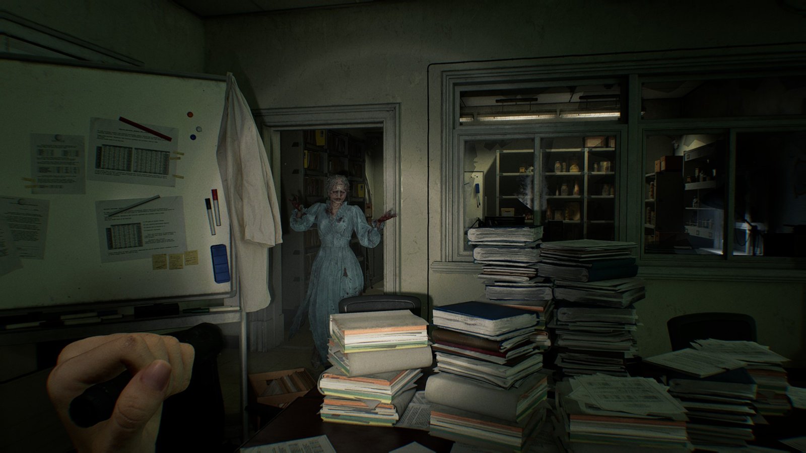 A zombie dressed in blue approaches Grace in RE9